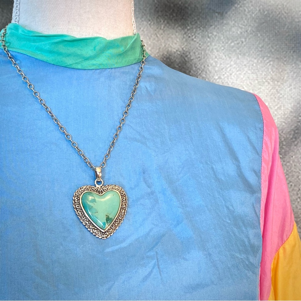 Barse all sterling and turquoise, with blue lighter blue, and splashes of green.